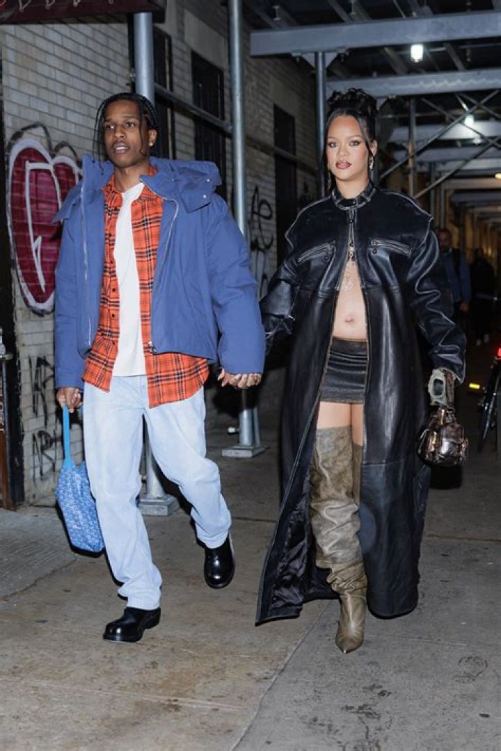 
Rihanna Slays Thigh High Boots & Mini Skirt Out With A$AP Rocky In NYC 